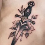14 Dagger Sternum Tattoo Ideas With Sharp Detail